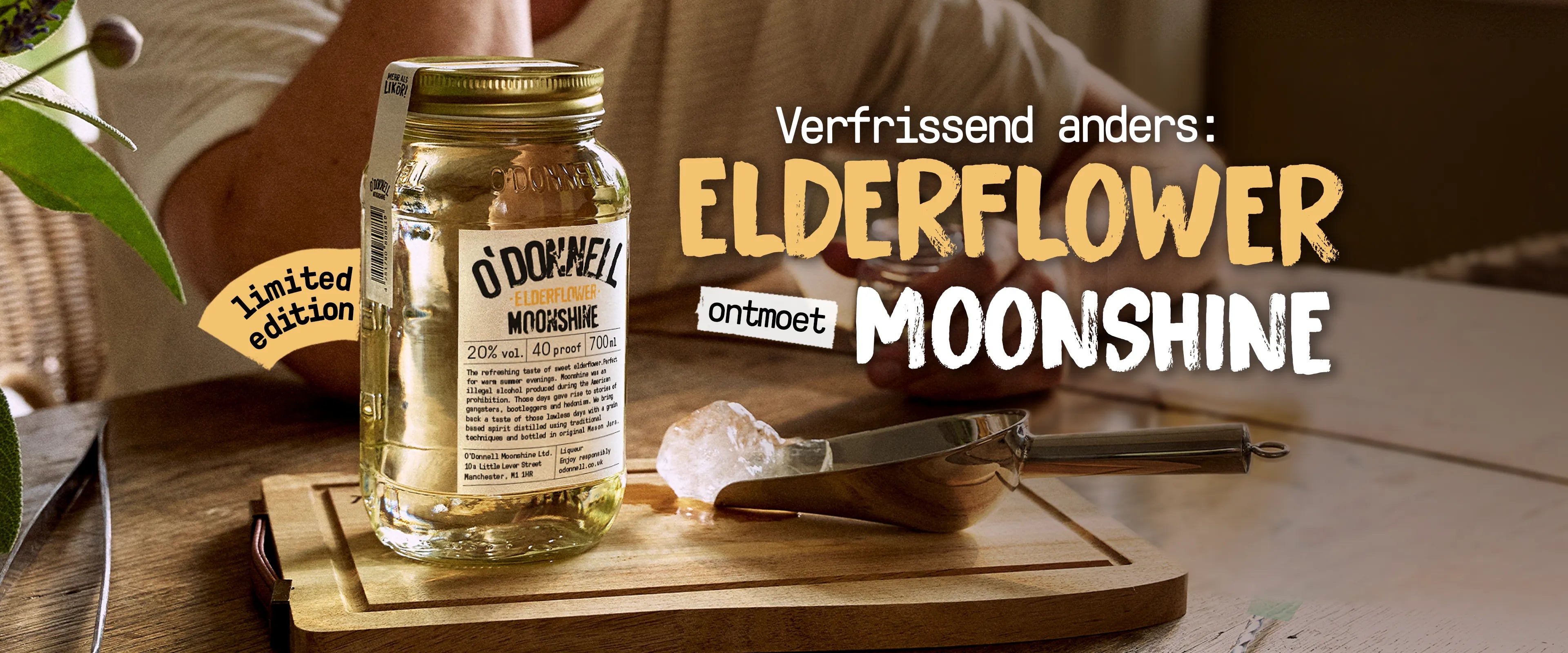 O'Donnell Moonshine Mobile LP-banner voor de nieuwe vlierbloesemsmaak, met een Mason-pot van 700 ml en een ijsschep op een houten plank met het merklogo.